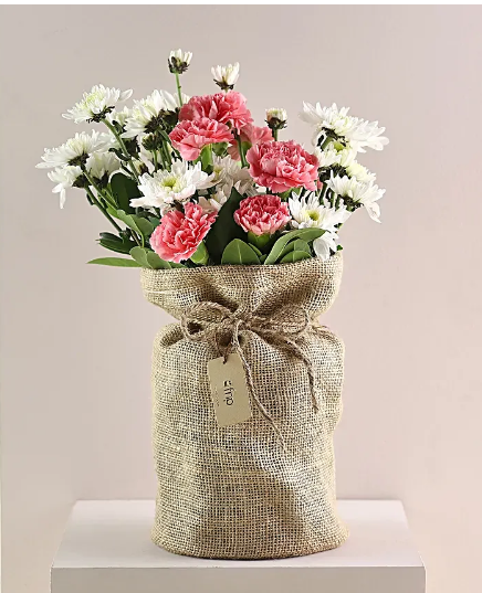 Floral Arrangement In Jute Covering